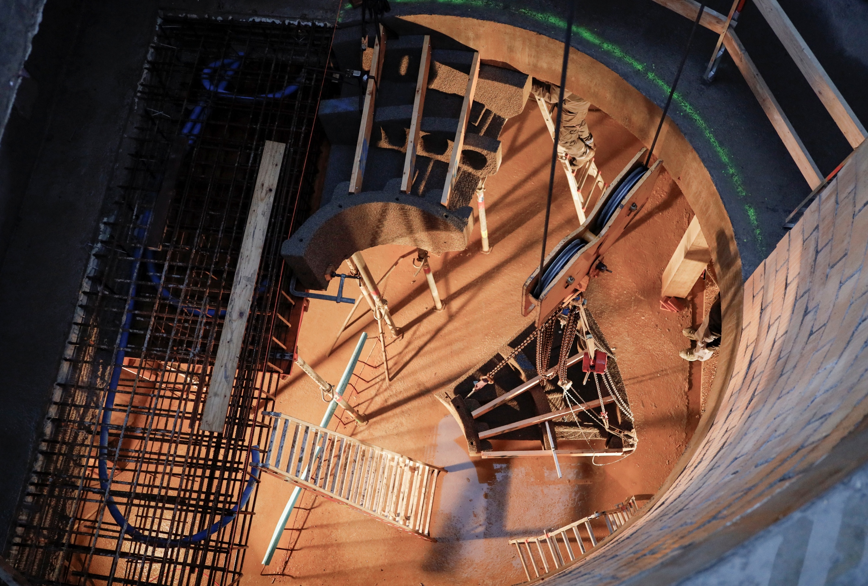 3D-printed staircase formwork installed at a construction site.